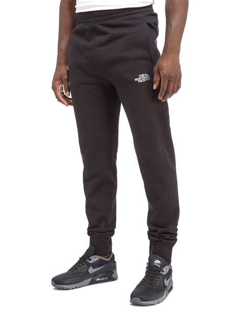 north face men's tracksuit bottoms.